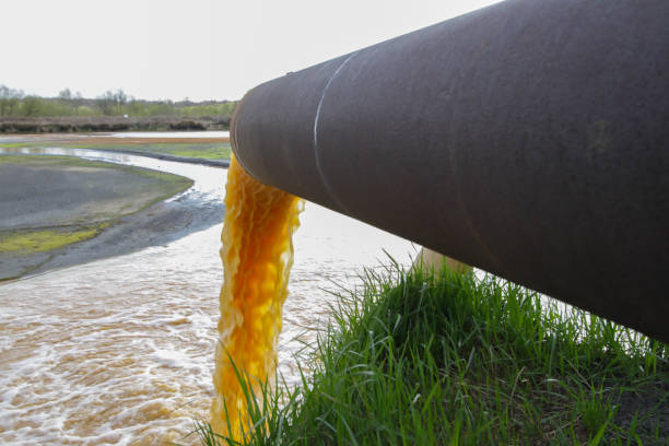 istock Wastewater spilling out of tube. 1165307714