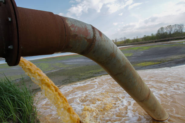 istock Wastewater spilling out of tube. 1165307841