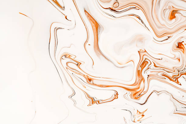 istock Flowing caramel raster background. Abstract brown and white mixed colors. 1165311961