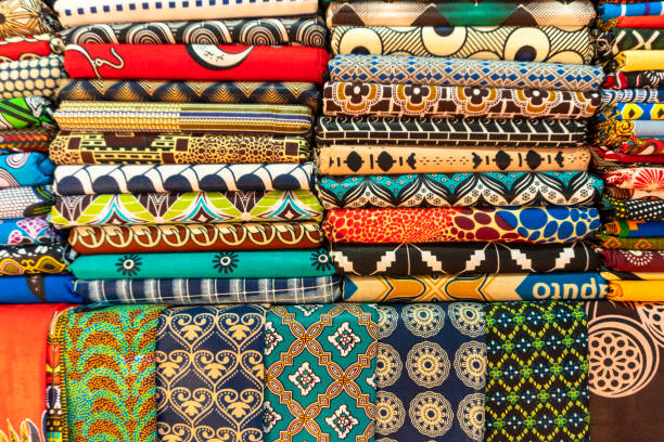 istock Plenty of colorful african fabrics 1165314564