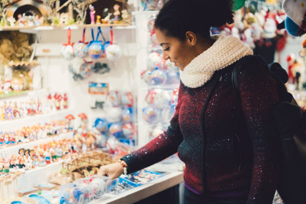 istock Tourist visiting Christmas market 1165320333