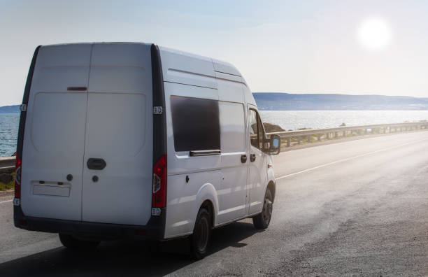 istock minibus moves along the highway 1165321723