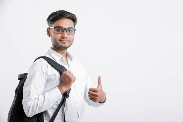istock young indian college student Showing Thumbs up 1165324994