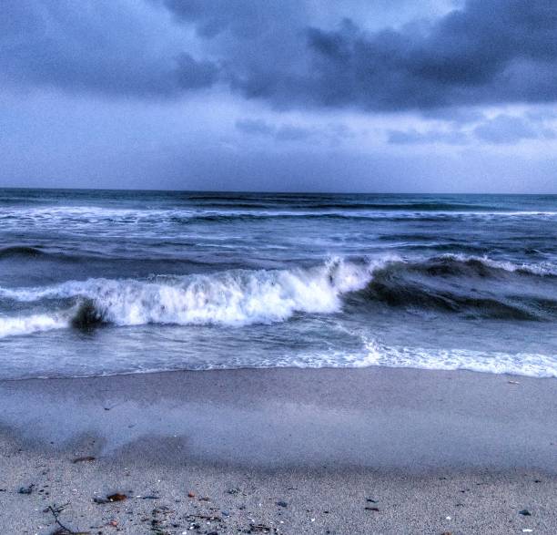 istock Waves at Pentewan beach in blue hour 1165325230