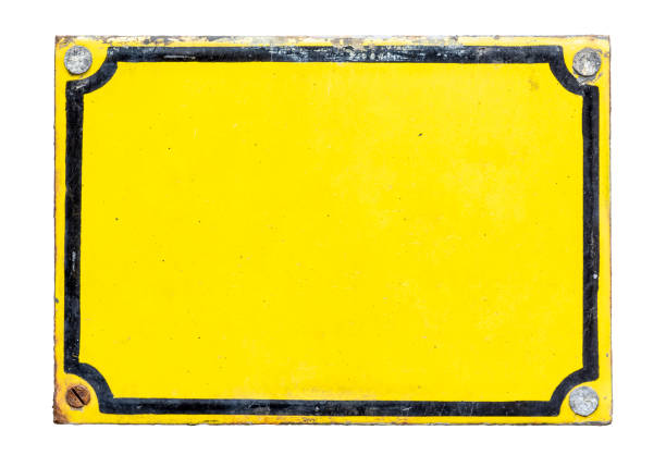 istock Blank, yellow, metal, old plaque isolated on white background 1165326659