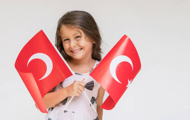 istock Little Girl With Turkish Flags 1165329386