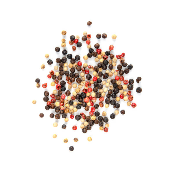 istock Black, red and white pepper isolated on white background 1165329920