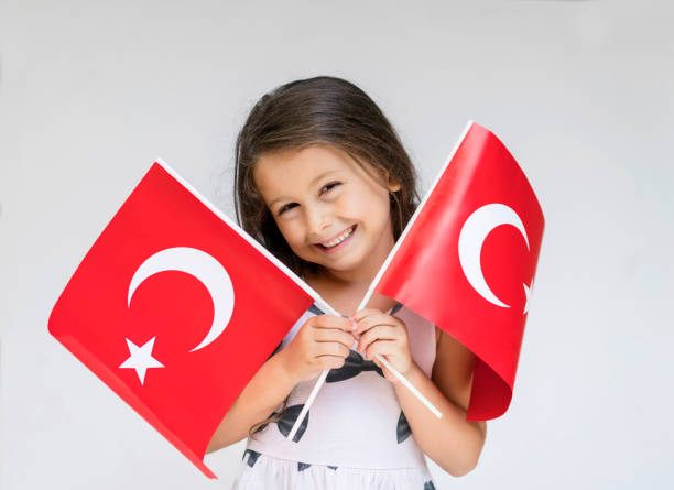 istock Little Girl With Turkish Flags 1165330072