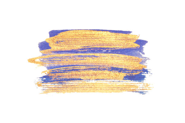 istock Abstract golden and blue watercolor stains on white background 1165331874