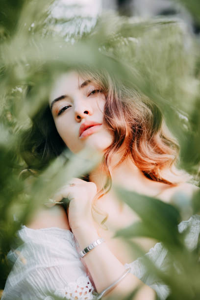 istock Beautiful girl in the field 1165331927