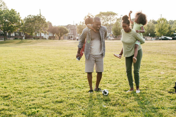 istock Playing soccer with kids 1165332620