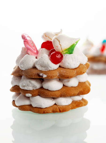 istock Cake with protein cream on a white glass table 1165333746