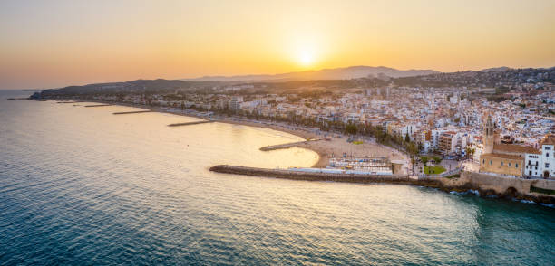 panoramic aerial view of sitges at sunset. catalonia. spain - port de barcelona imagens e fotografias de stock