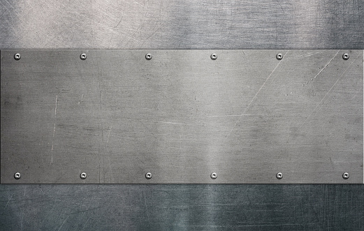 Steel plate on brushed metal background