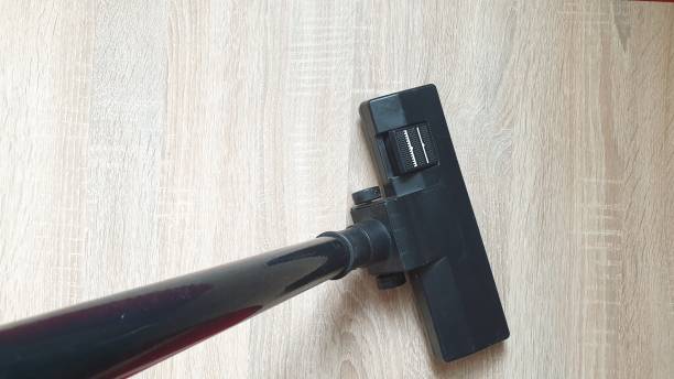 istock A vacuum cleaner. Brush vacuum cleaner. Vacuuming. 1165340465