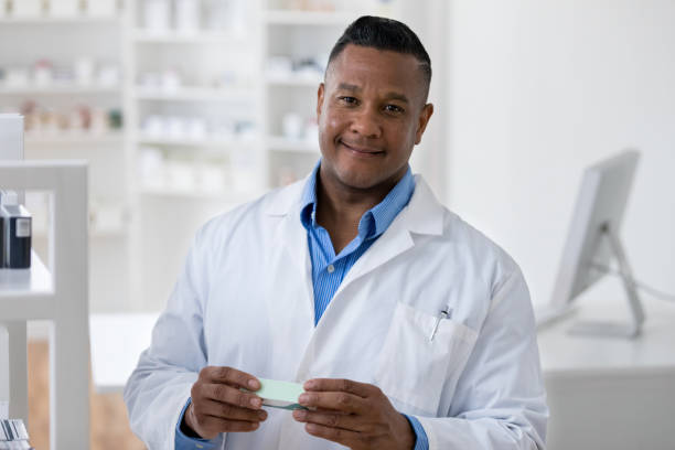 istock Confident mature mixed race male pharmacist 1165344712