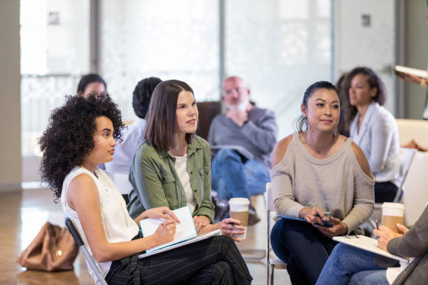istock As unseen small group leader speaks, members listen attentively 1165345173