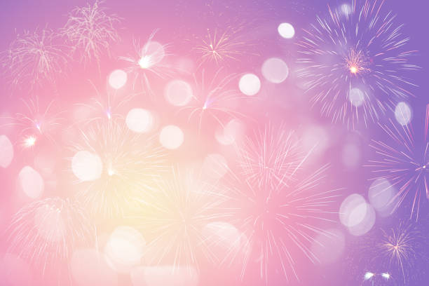 istock colorful fireworks on bokeh background 1165345293