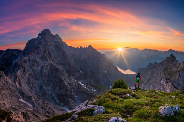 istock Mountainer at glory sunrise with view to Watzmann East Wall 1165346535