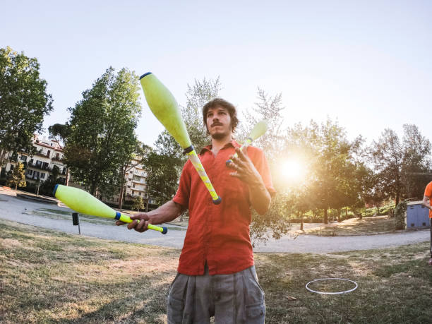 istock Young adult juggler training at the park 1165346539