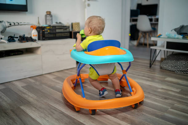 istock First steps of the boy in a baby walker 1165352565