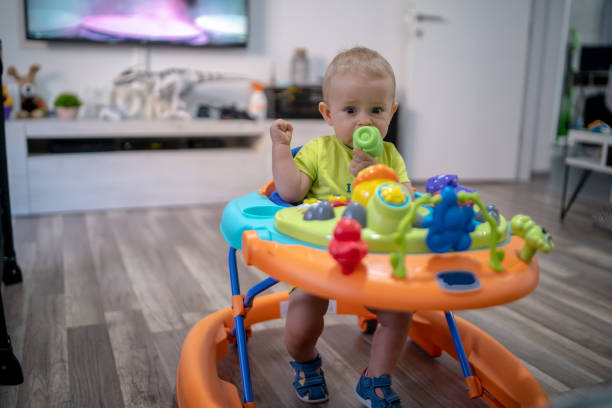 istock First steps of the boy in a baby walker 1165352774