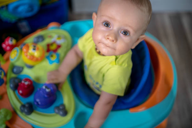 istock First steps of the boy in a baby walker 1165352822