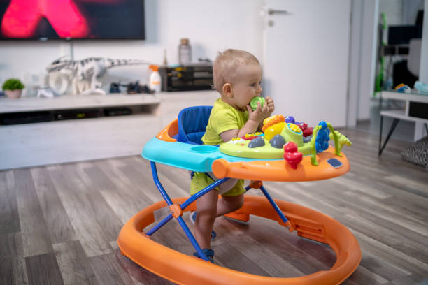 istock First steps of the boy in a baby walker 1165352895