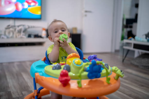 istock First steps of the boy in a baby walker 1165352971