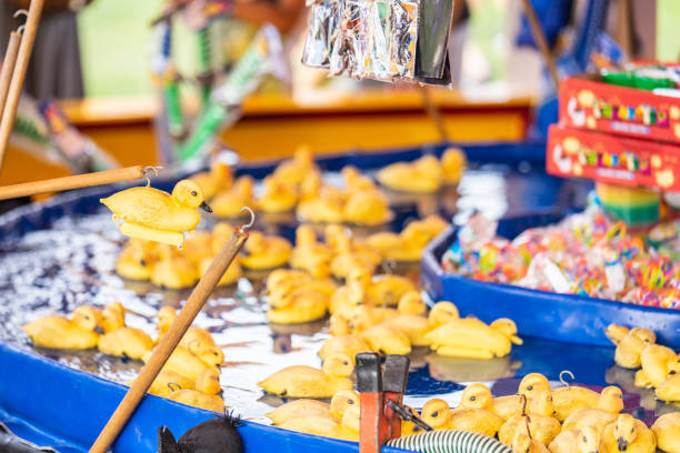 Bedford,Bedfordshire,UK,June 2,2019.Fairground hook a rubber duck chance game.
