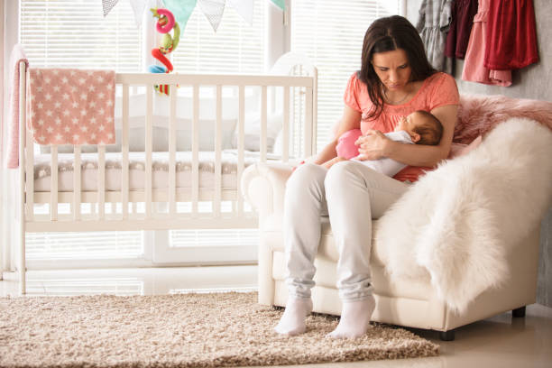 istock Mother and her baby at home 1165357258