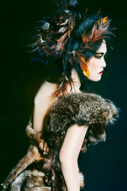 istock Feather and Fur Asian Beauty Back View 1165358042