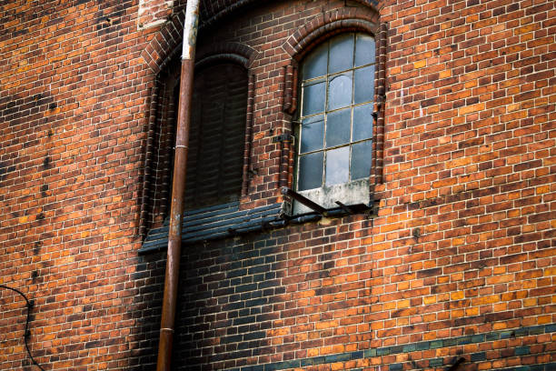 istock The old chimney is covered with soot. Sooty wall from smoke 1165358309