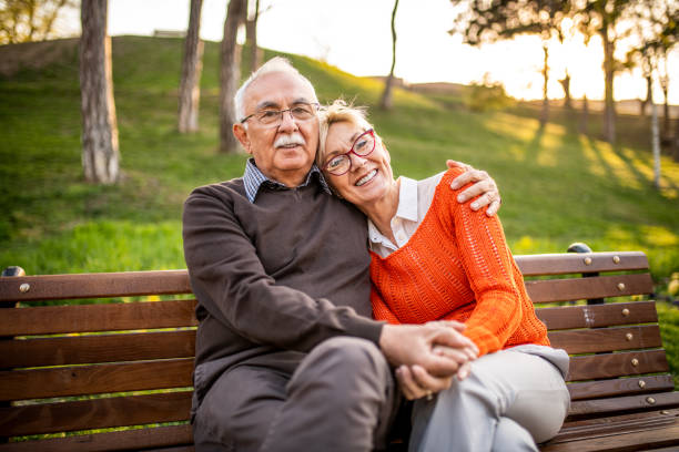 istock Senior couple relaxing at the park. 1165359490