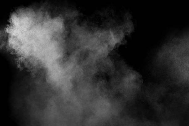 istock White smoke blow on dark background. 1165359887