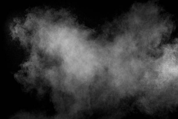 istock White smoke blow on dark background. 1165360503