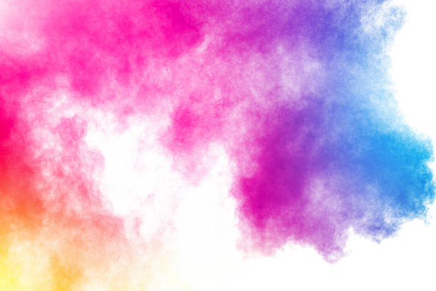 istock Abstract multi color powder explosion on white background.Freeze motion of dust particles splash. 1165360569