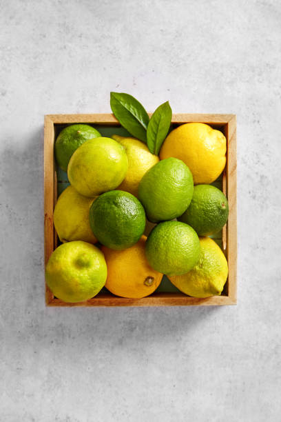 istock Lemon and lime variety in a box viewed from above. Top view 1165361239