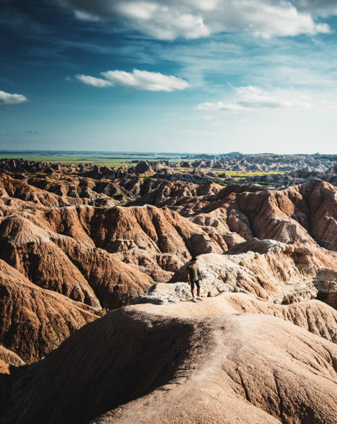 istock hiking at the badlands national park 1165365618