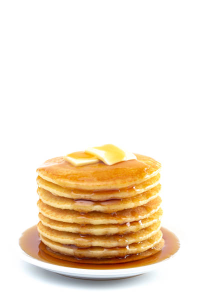 istock Stack of Freshly Made Buttermilk Pancakes with Syrup and Butter Isoalted on a White Background 1165370946