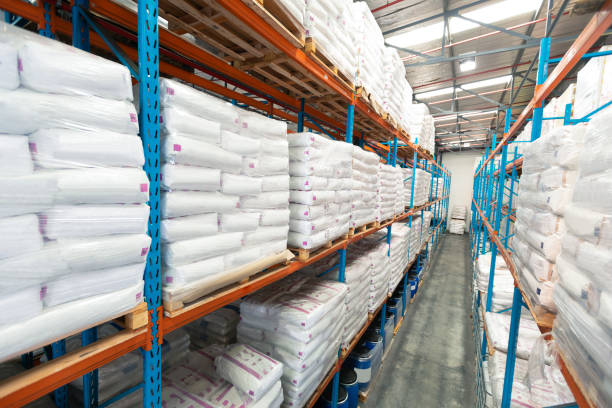 istock Barrel and goods arranged on a rack in warehouse 1165374247