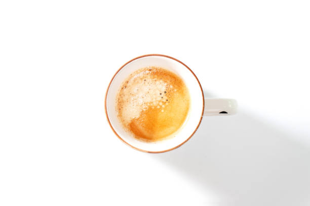 istock coffee cup in the morning light on white background 1165375316