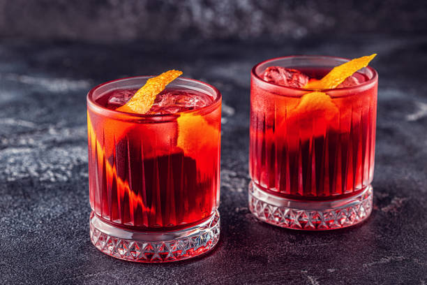istock Negroni cocktail with orange peel and ice 1165375673
