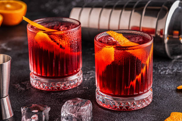 istock Negroni cocktail with orange peel and ice 1165375746