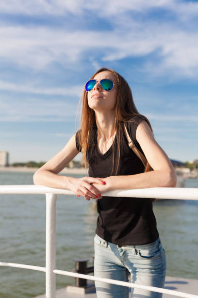 istock Woman in river,  sunglasses aviator, close up 1165379517