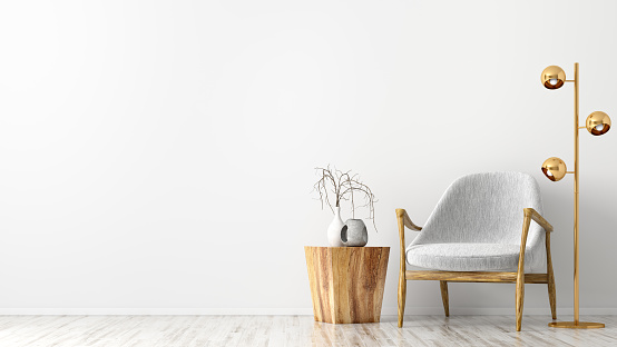 Interior of living room with wooden coffee table, golden floor lamp and gray armchair against white wall with copy space 3d rendering