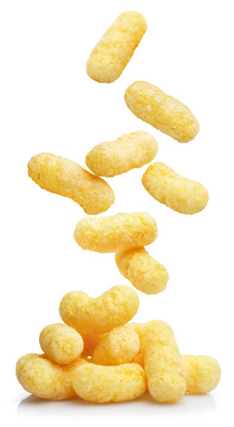 сладкие кукурузные палочки на белом - roasted macro freshness vertical стоковые фото и изображения