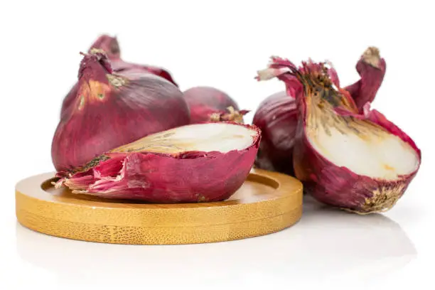 Photo of Stale red onion isolated on white