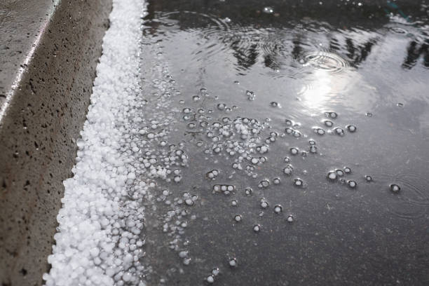 istock Hail on the pavement after a thunderstorm on summer day 1165386234