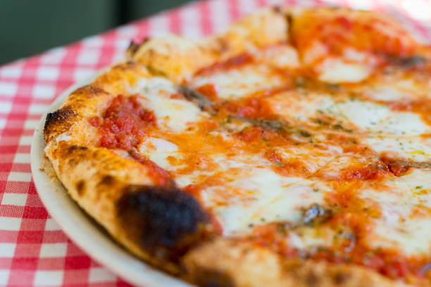 istock Close-up for classic pizza with mozzarella cheese. 1165387111
